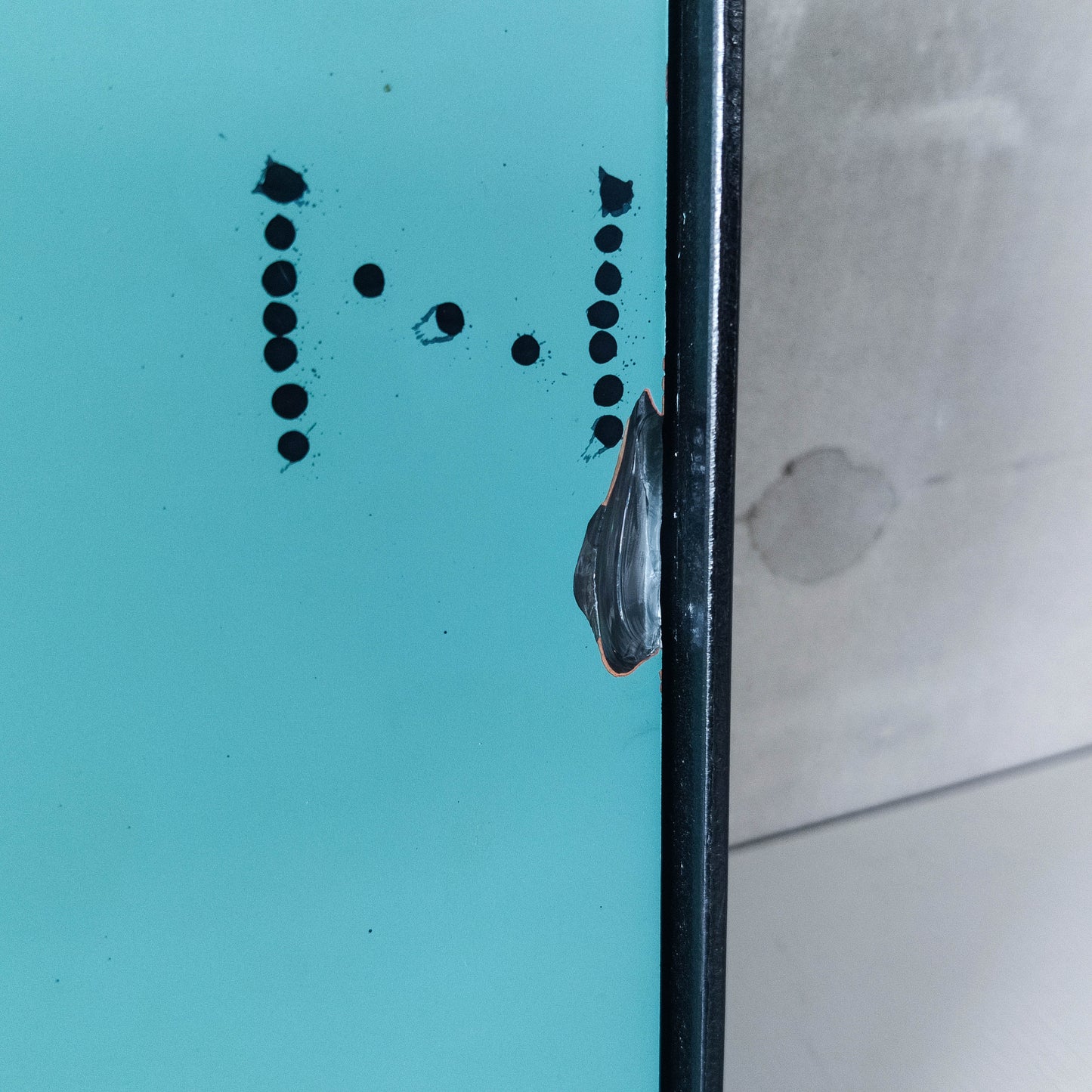 1990s handmade steel metalwork asymmetric mirror with candle sconce