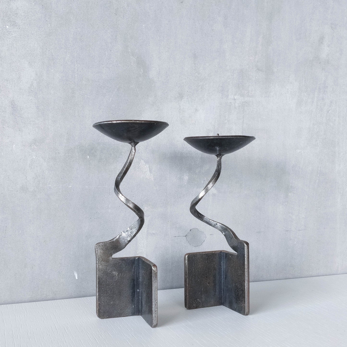 Pair of brutalist style metalwork forged steel sculptural candle holders