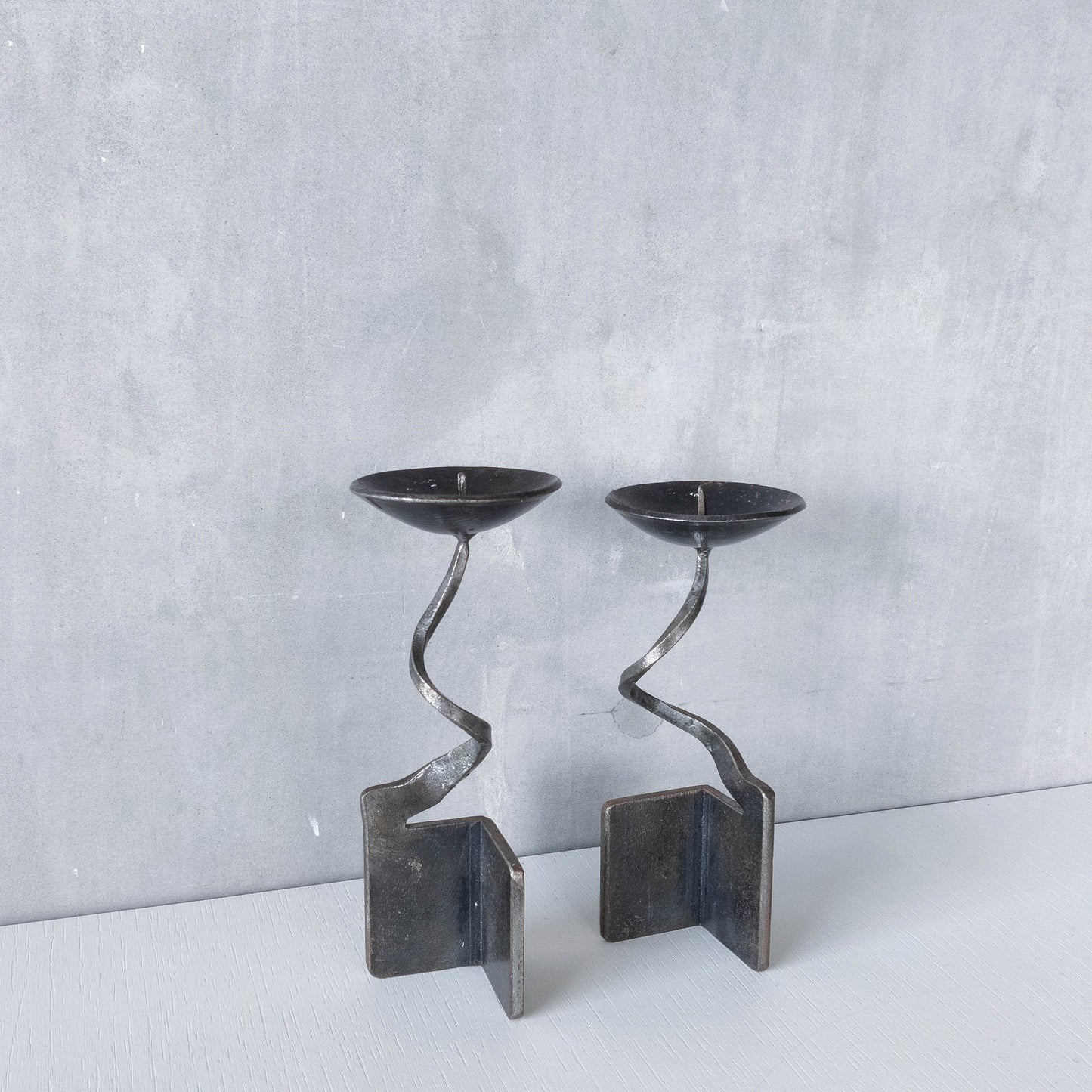 Pair of brutalist style metalwork forged steel sculptural candle holders