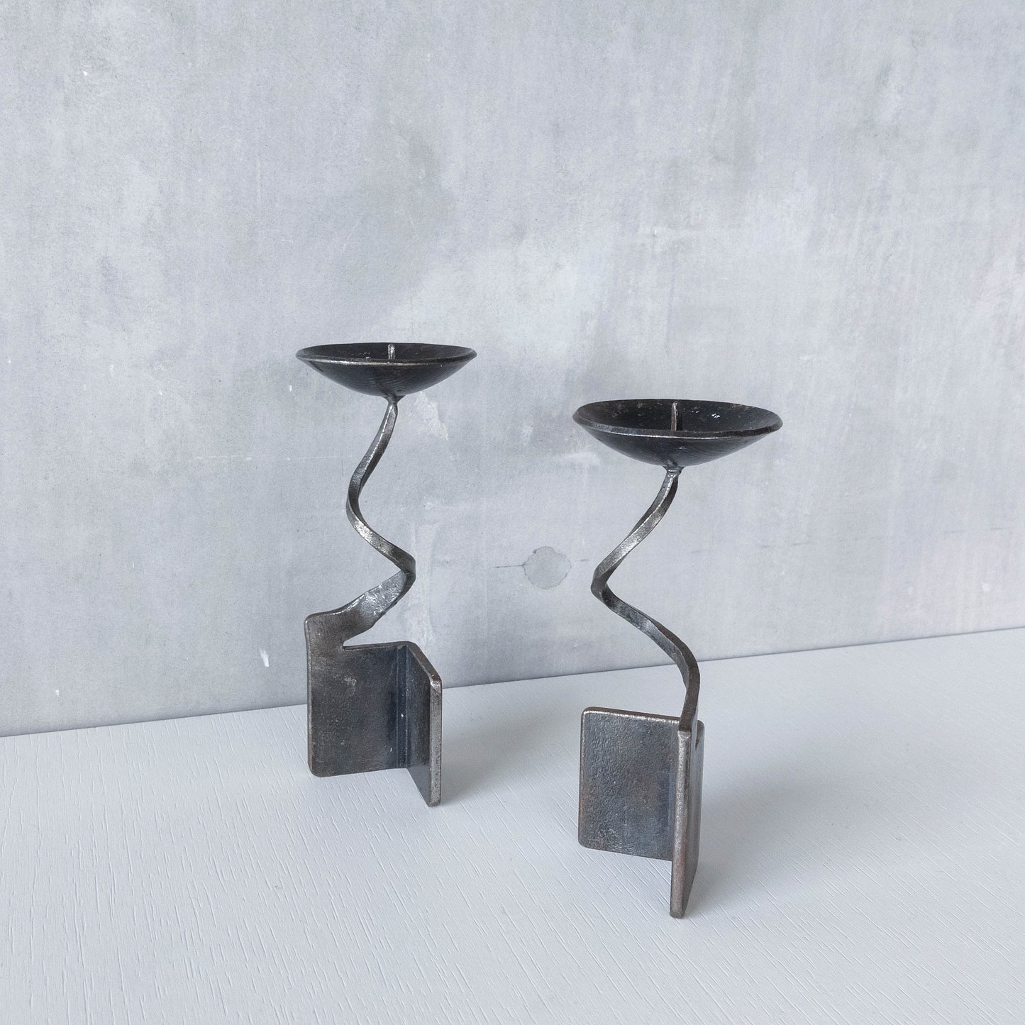 Pair of brutalist style metalwork forged steel sculptural candle holders