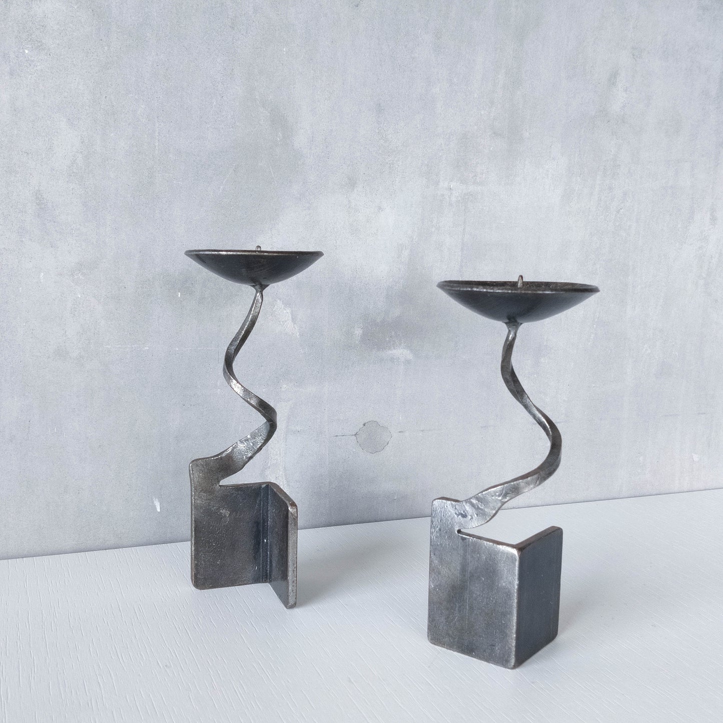 Pair of brutalist style metalwork forged steel sculptural candle holders