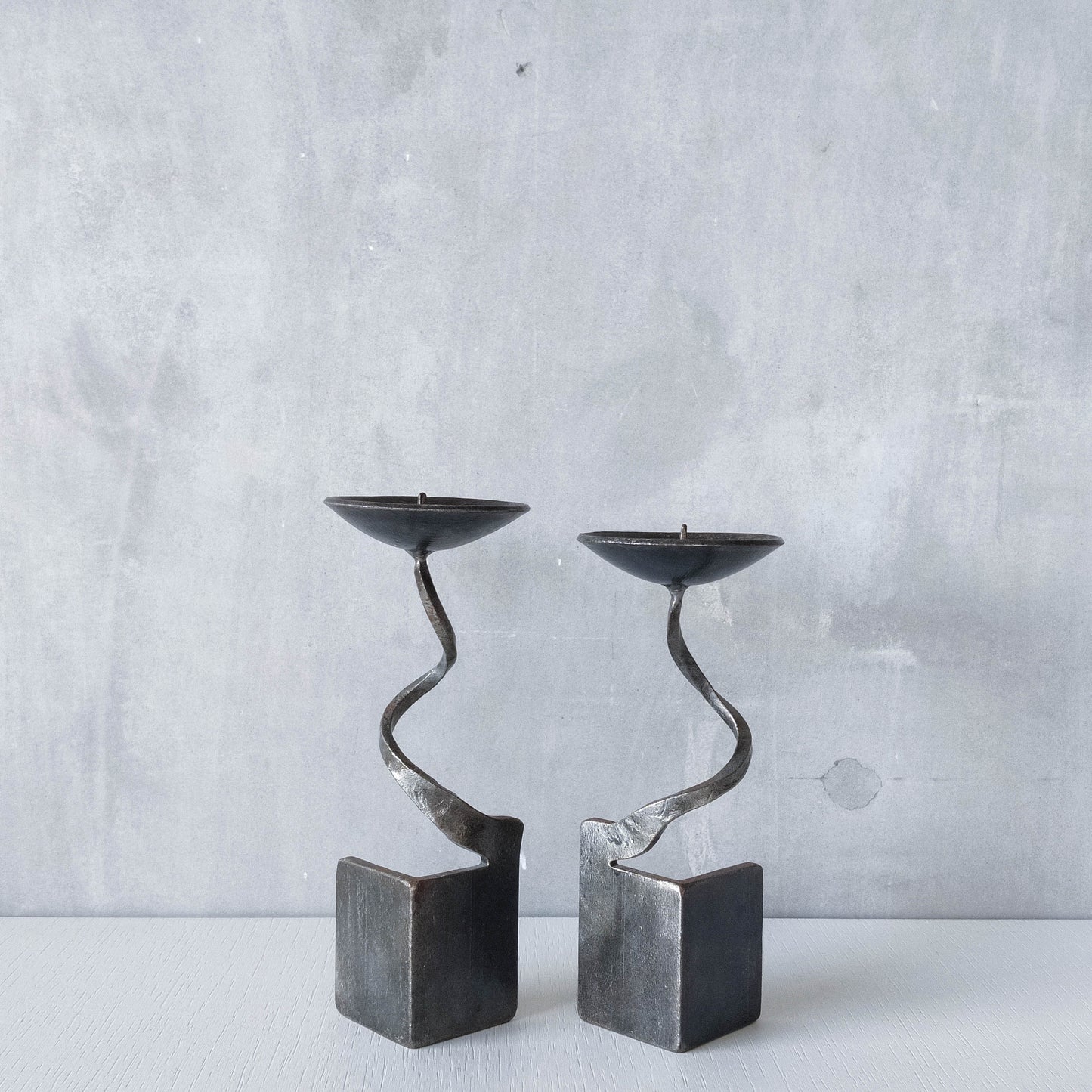 Pair of brutalist style metalwork forged steel sculptural candle holders