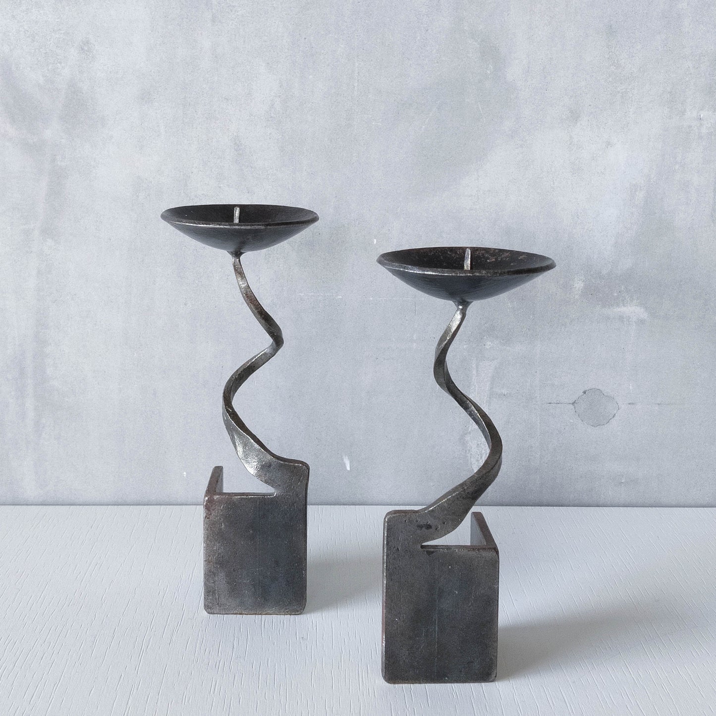 Pair of brutalist style metalwork forged steel sculptural candle holders