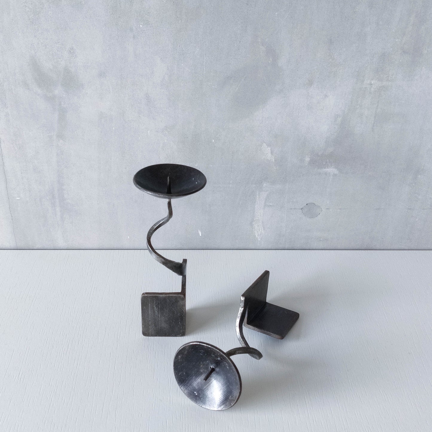 Pair of brutalist style metalwork forged steel sculptural candle holders