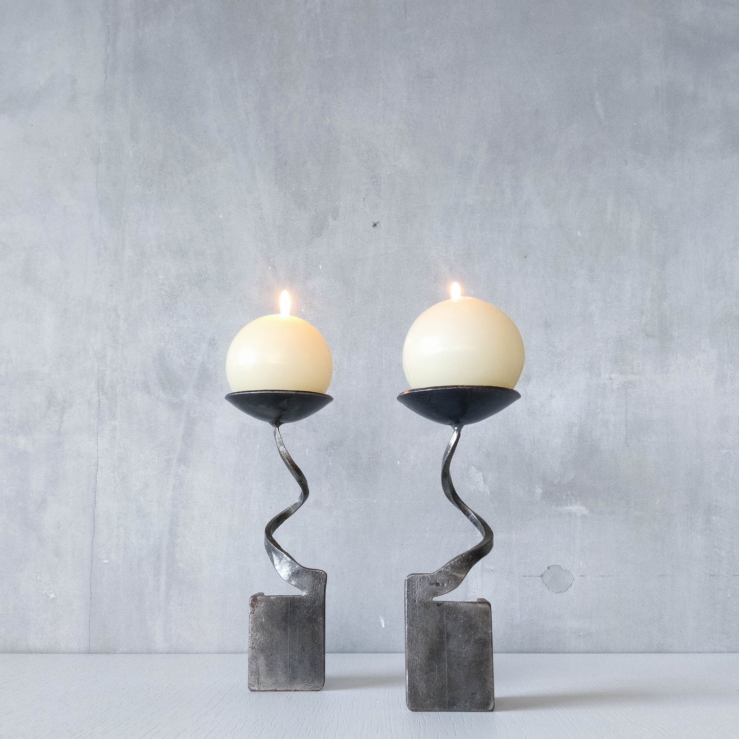 Pair of brutalist style metalwork forged steel sculptural candle holders