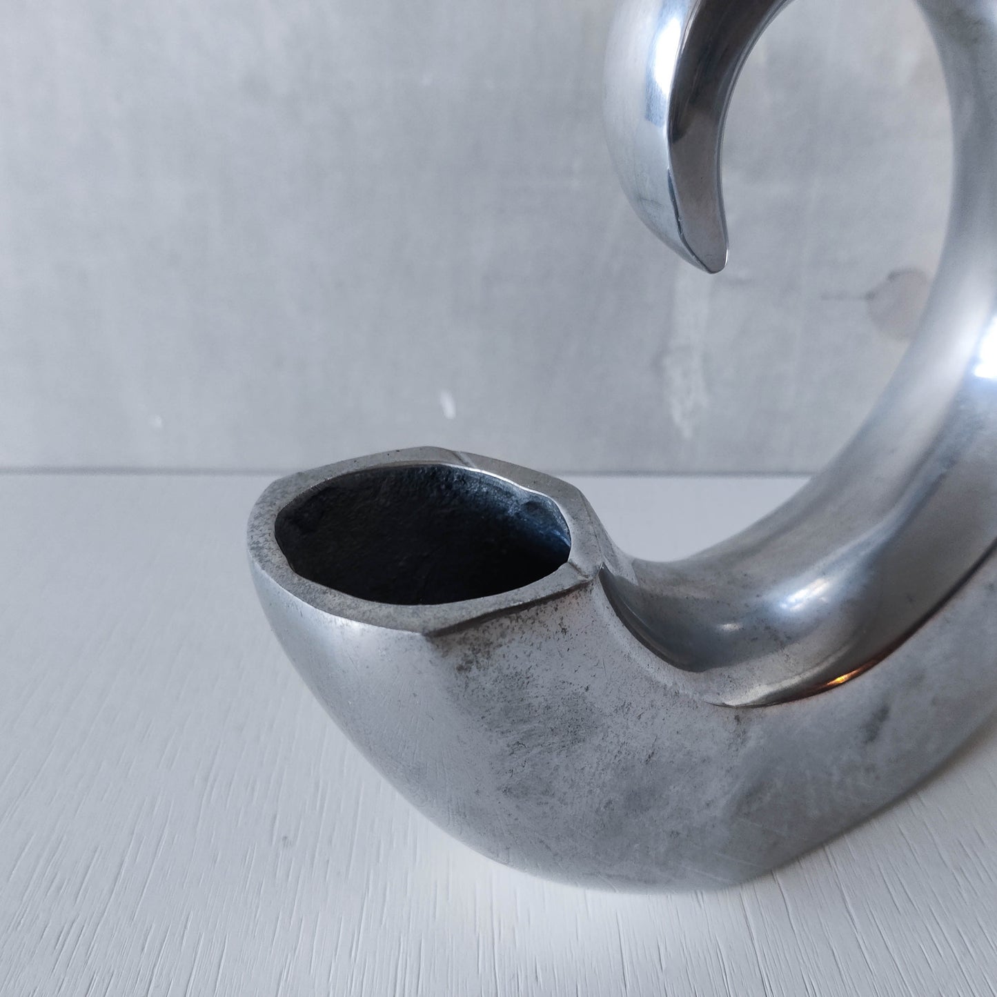 Vintage 1990s cast aluminium curved C shaped sculptural vase signed