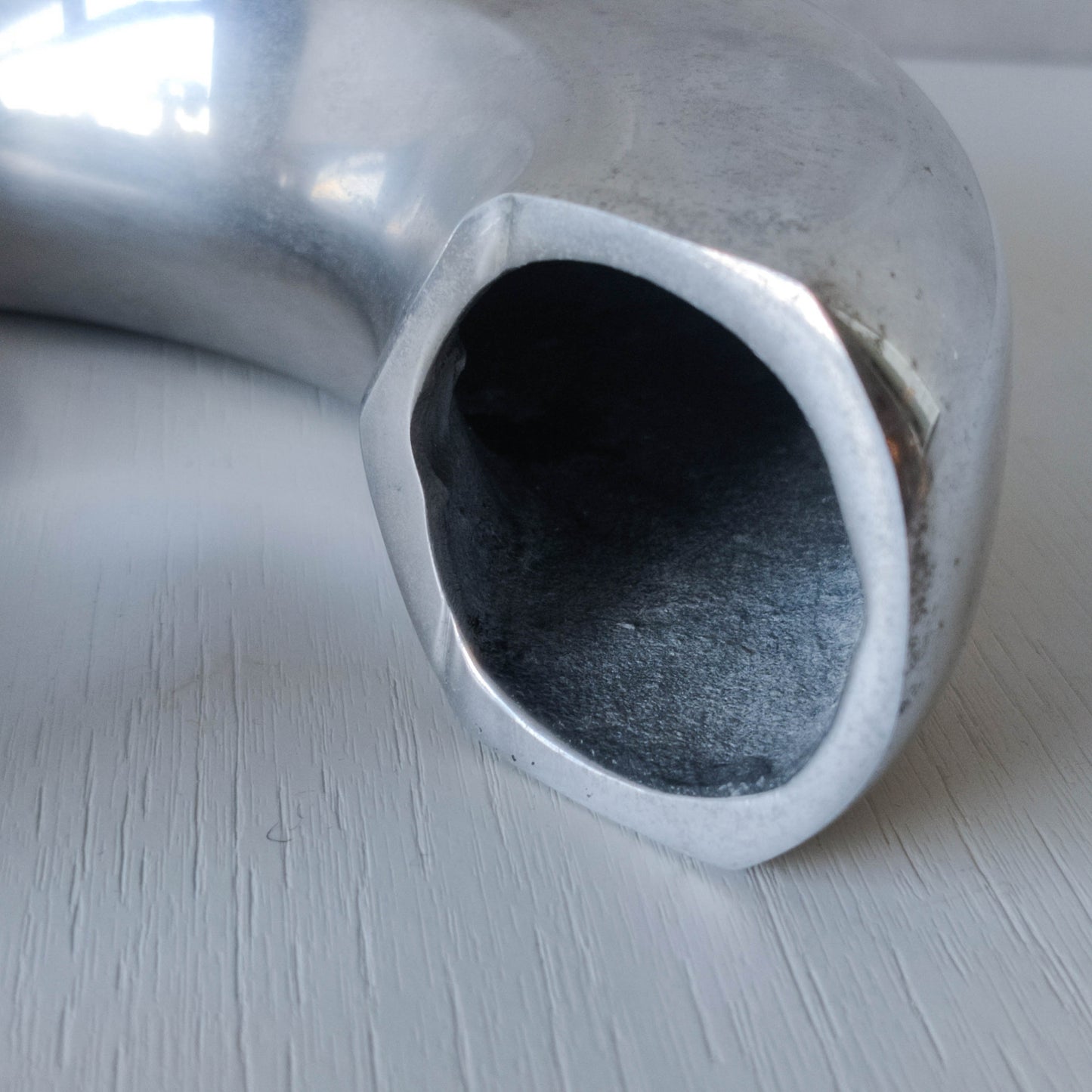 Vintage 1990s cast aluminium curved C shaped sculptural vase signed