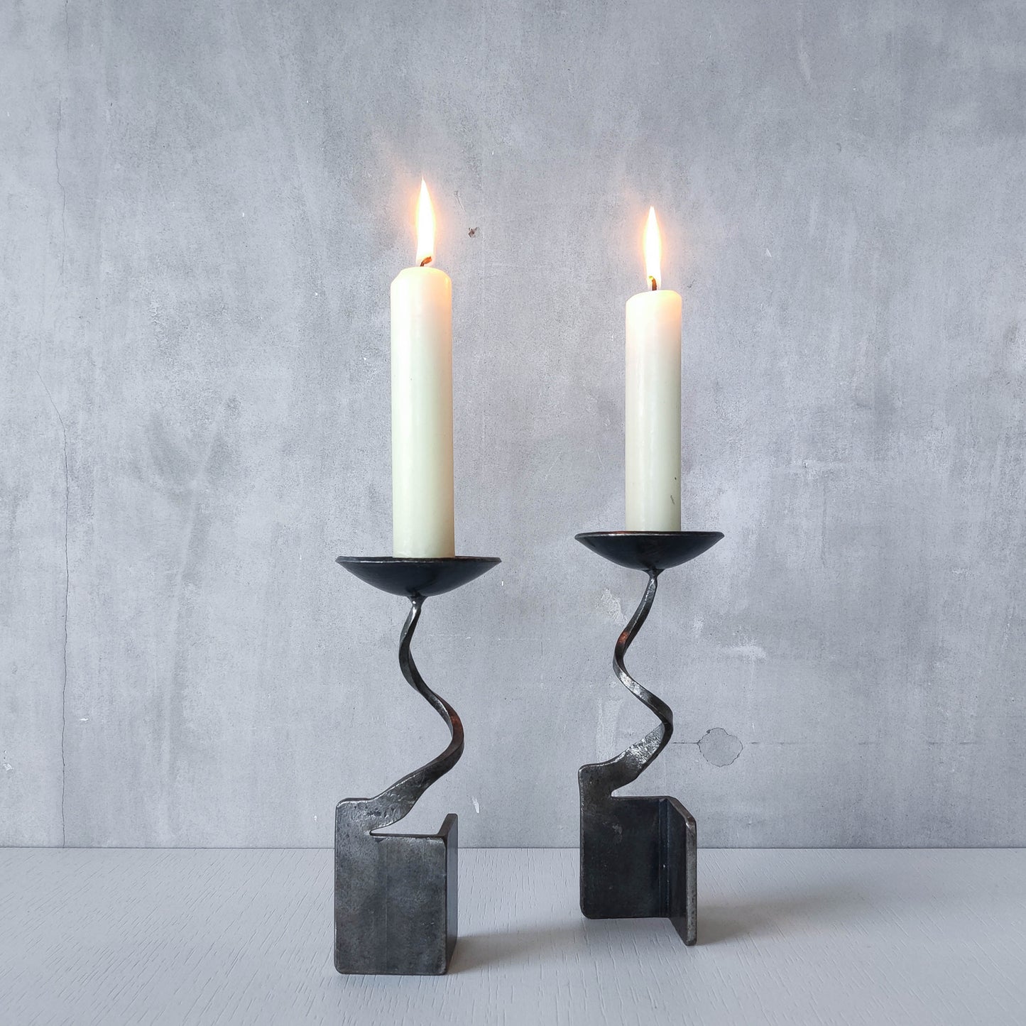 Pair of brutalist style metalwork forged steel sculptural candle holders
