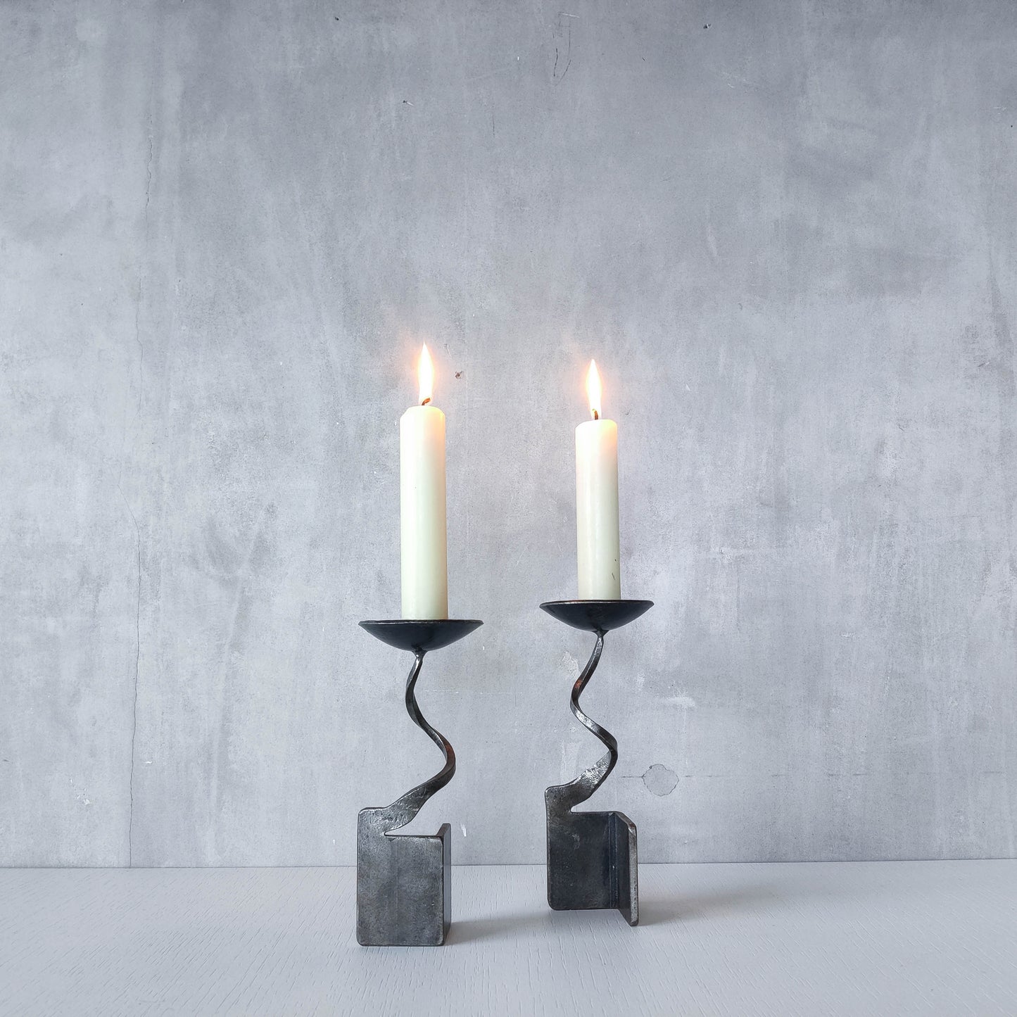 Pair of brutalist style metalwork forged steel sculptural candle holders