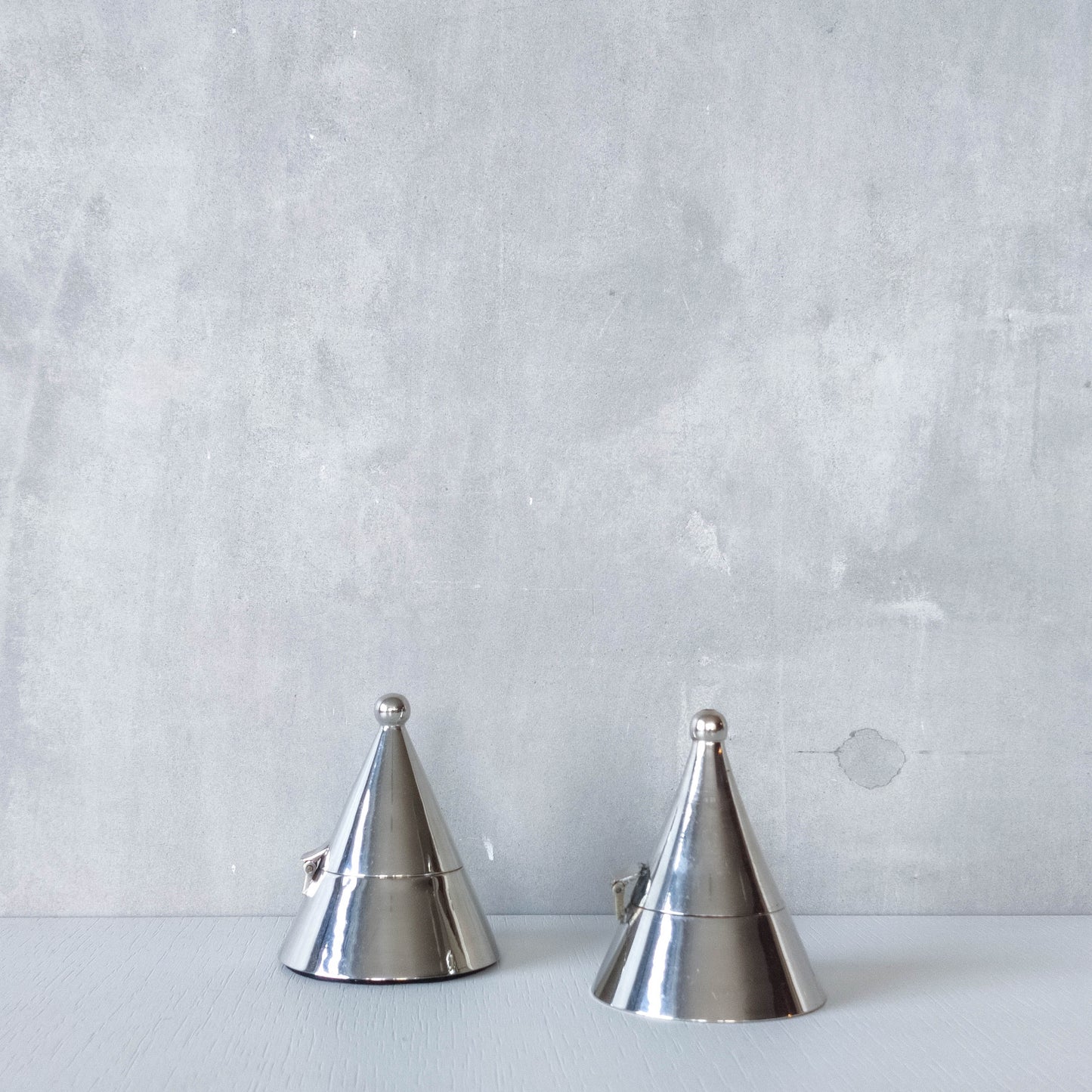 Pair of vintage conical silver chrome tea light holders Aldo Rossi Alessi modernist