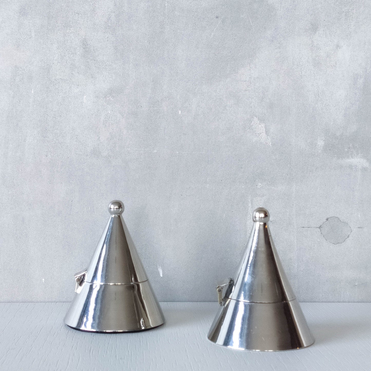 Pair of vintage conical silver chrome tea light holders Aldo Rossi Alessi modernist