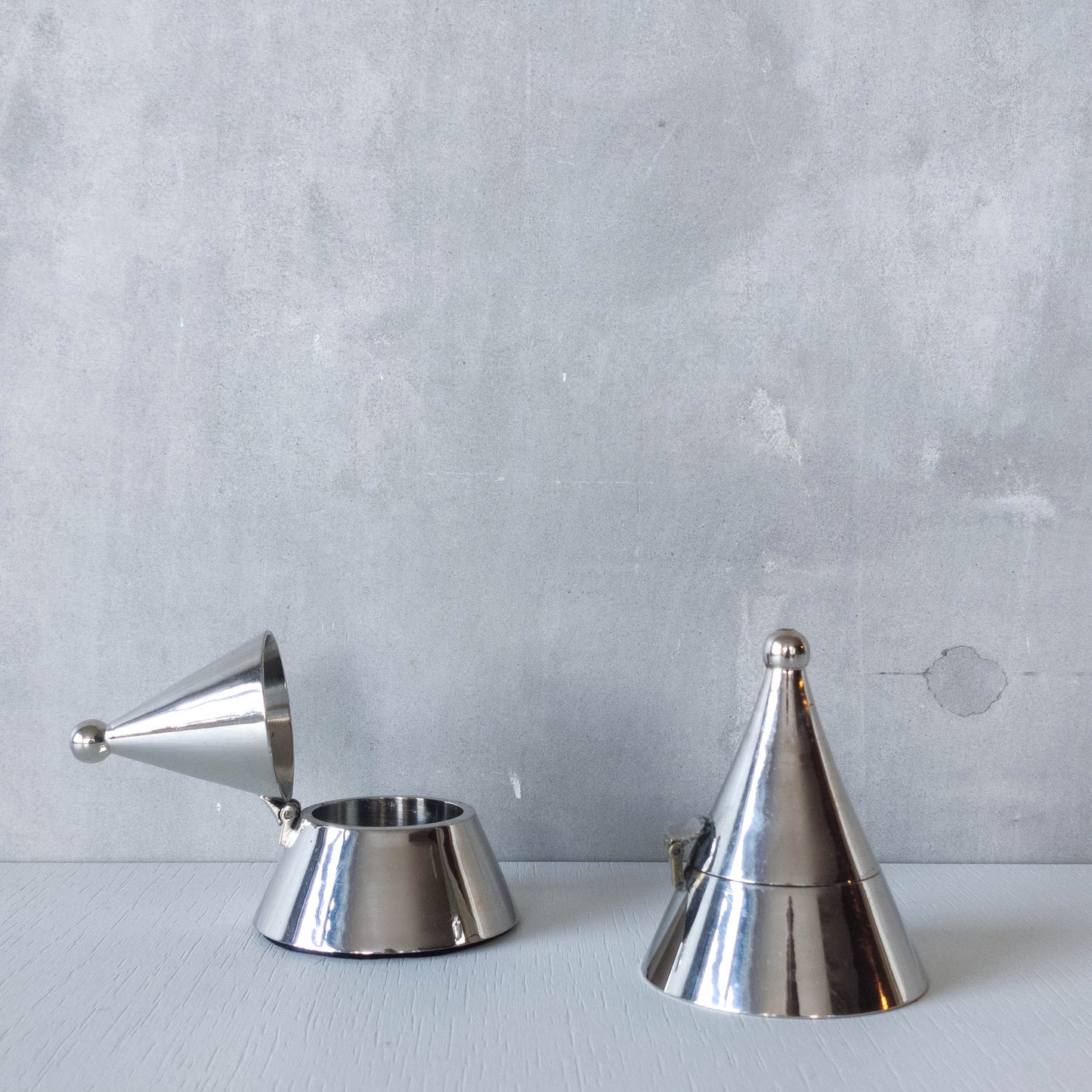 Pair of vintage conical silver chrome tea light holders Aldo Rossi Alessi modernist