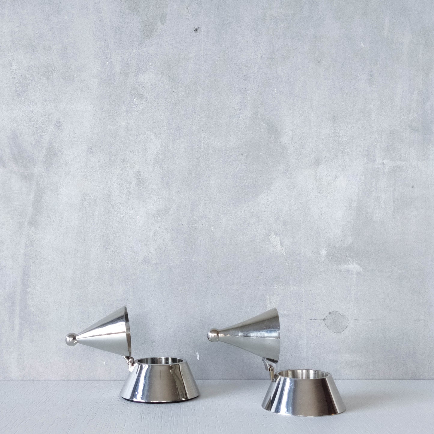 Pair of vintage conical silver chrome tea light holders Aldo Rossi Alessi modernist