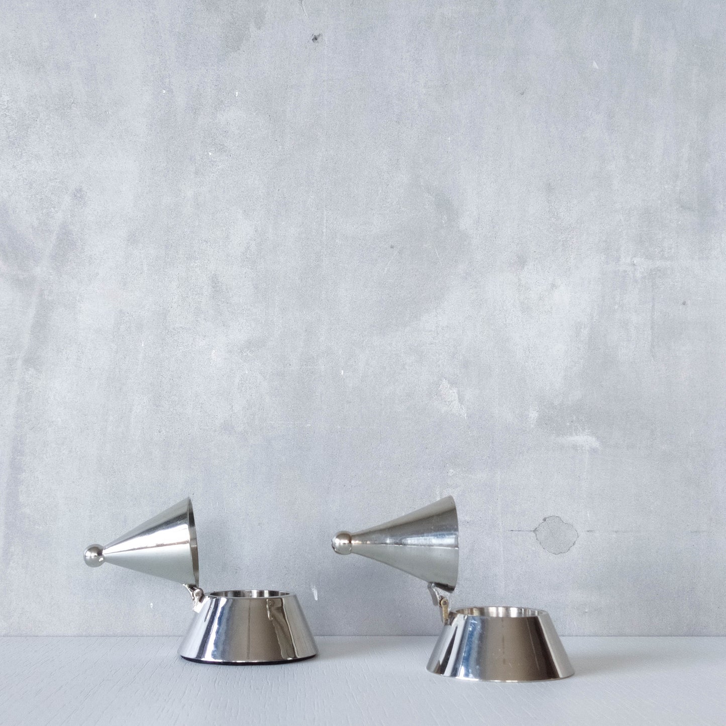 Pair of vintage conical silver chrome tea light holders Aldo Rossi Alessi modernist