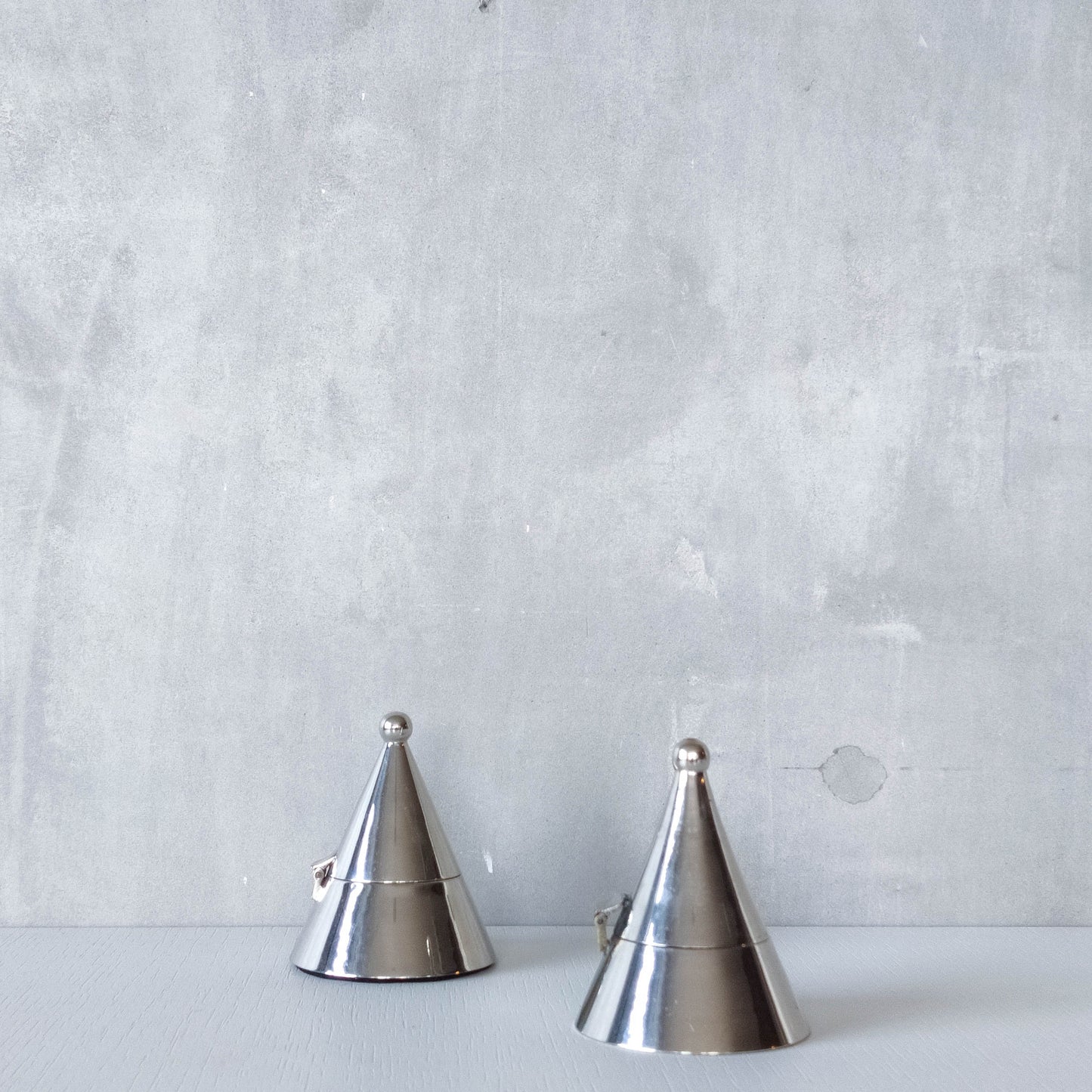 Pair of vintage conical silver chrome tea light holders Aldo Rossi Alessi modernist