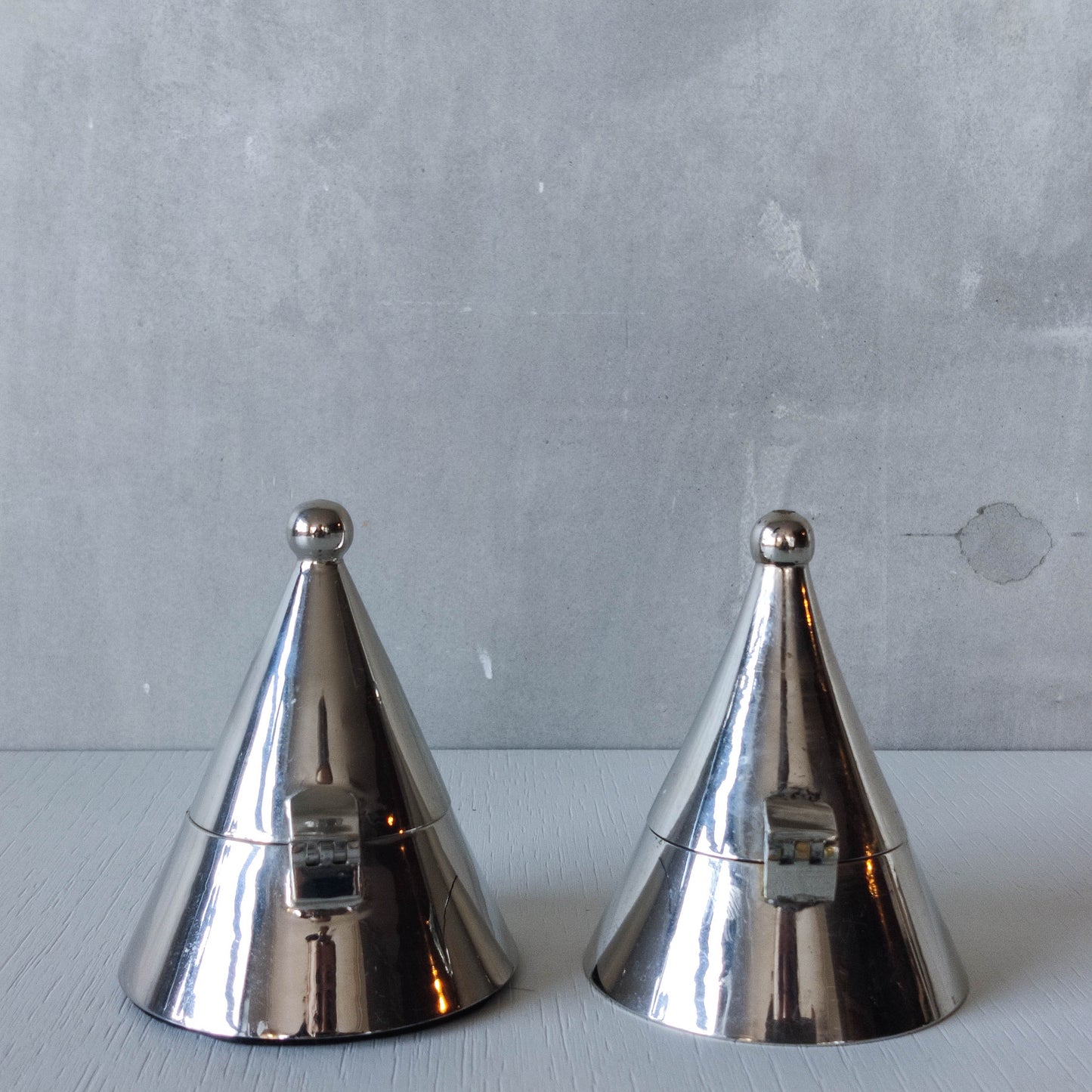 Pair of vintage conical silver chrome tea light holders Aldo Rossi Alessi modernist