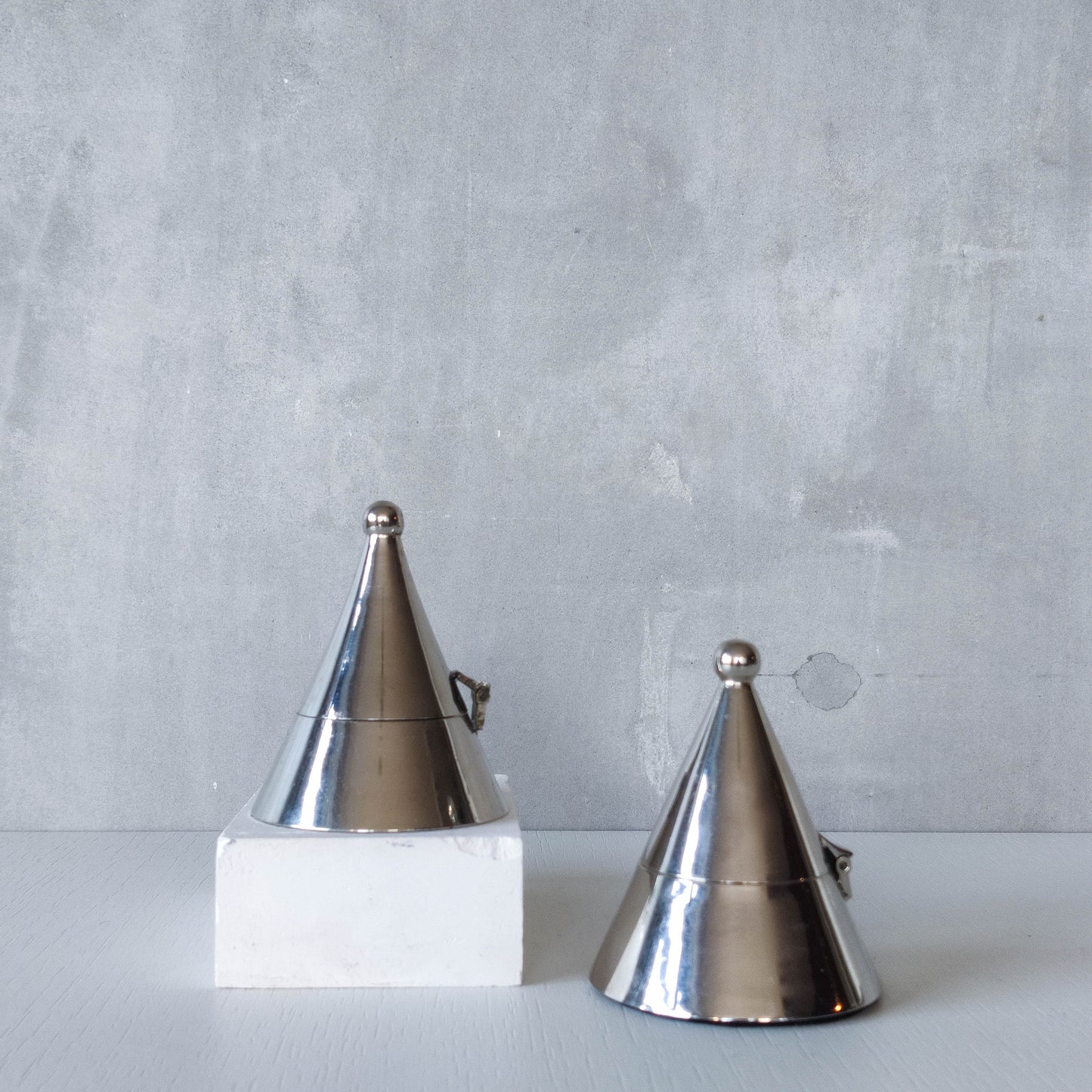 Pair of vintage conical silver chrome tea light holders Aldo Rossi Alessi modernist