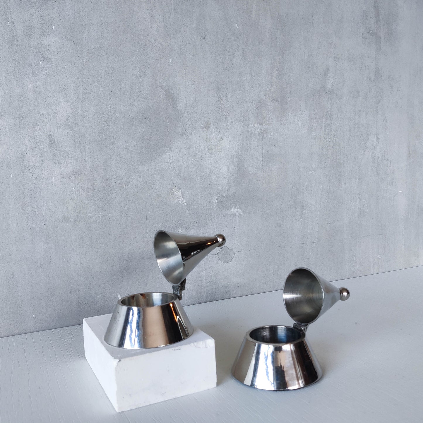 Pair of vintage conical silver chrome tea light holders Aldo Rossi Alessi modernist