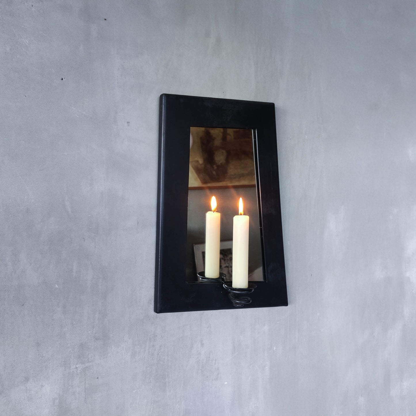 1990s handmade steel metalwork asymmetric mirror with candle sconce