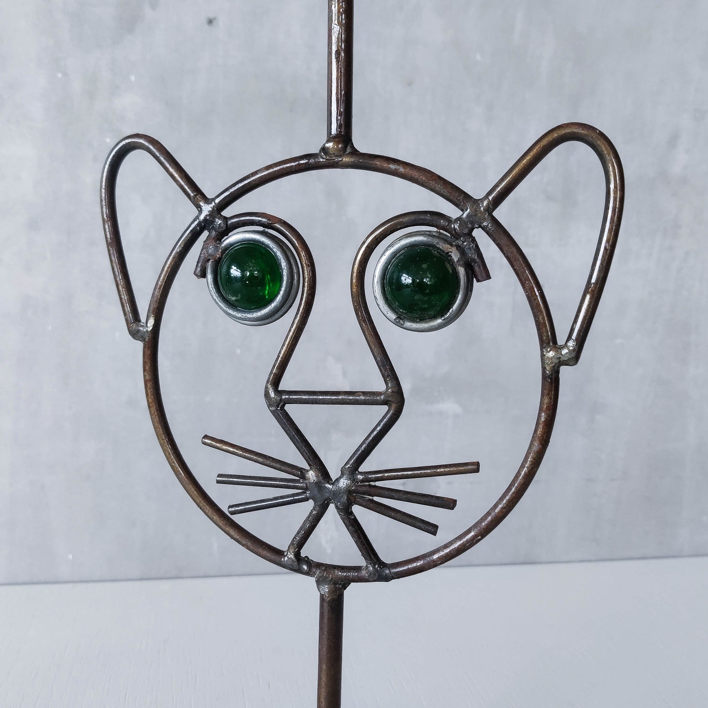 Vintage metalwork welded steel large cat face candle holder with green glass eyes