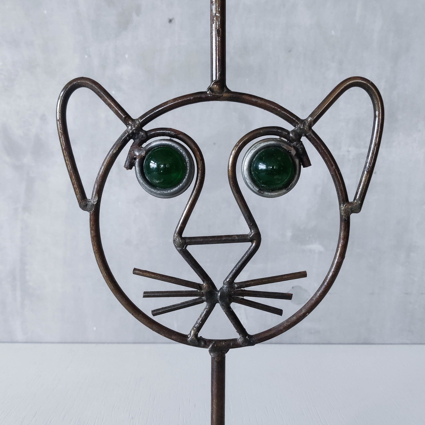 Vintage metalwork welded steel large cat face candle holder with green glass eyes