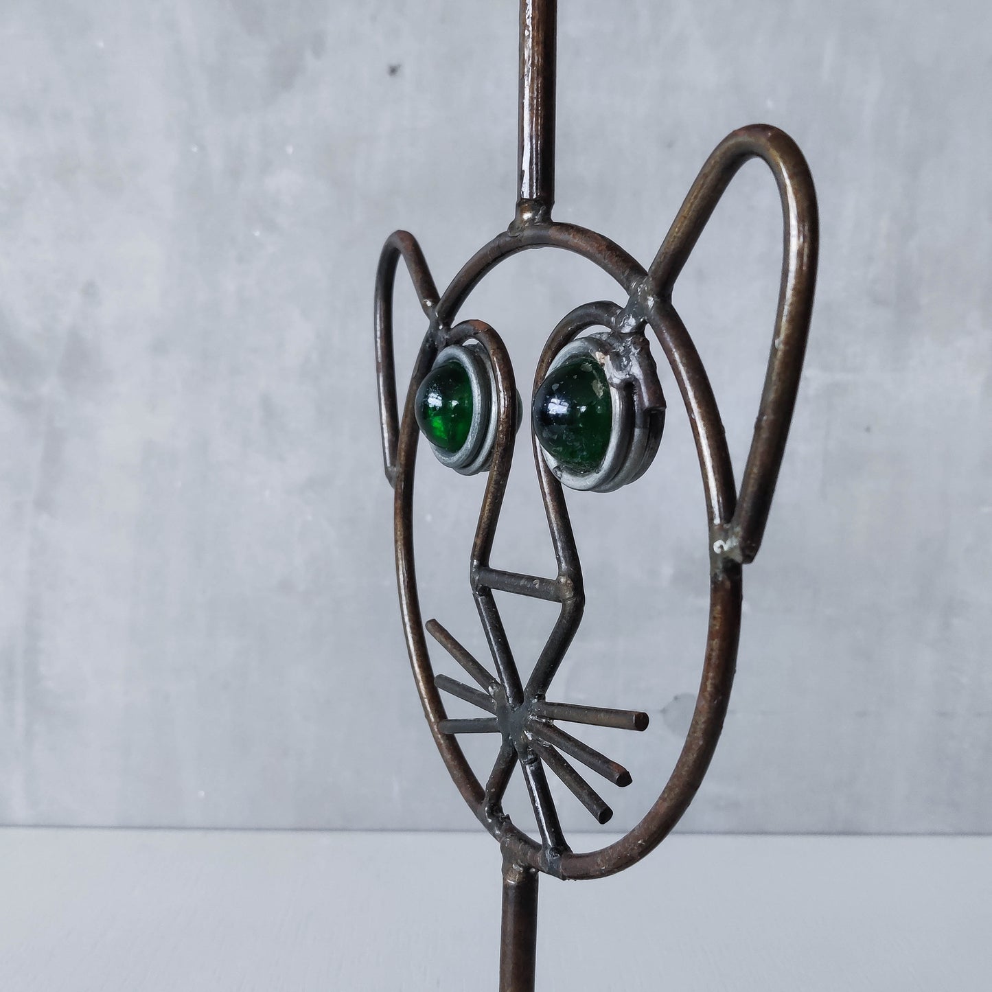 Vintage metalwork welded steel large cat face candle holder with green glass eyes