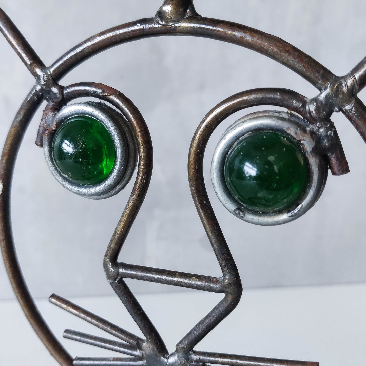 Vintage metalwork welded steel large cat face candle holder with green glass eyes
