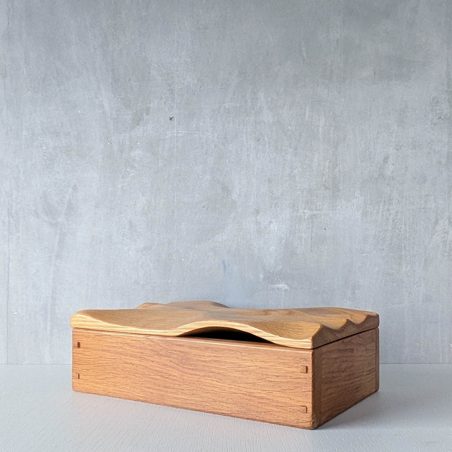 Artisan made oak wooden handmade lidded carved wave box