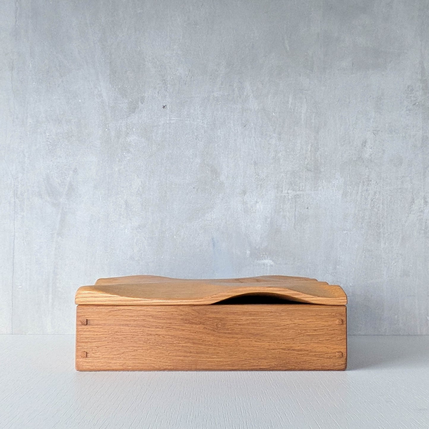 Artisan made oak wooden handmade lidded carved wave box
