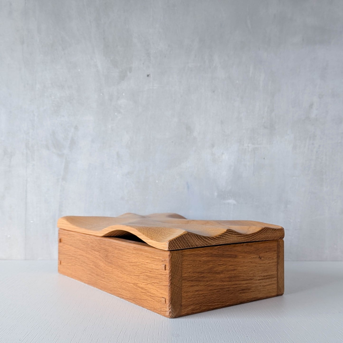 Artisan made oak wooden handmade lidded carved wave box