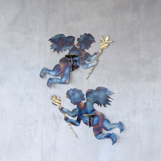 Pair of vintage metalwork torch cut steel cherub wall candle sconces