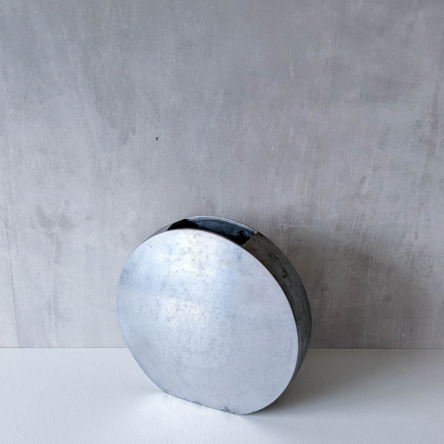 Vintage large sculptural round flat Art Deco style cast aluminium vase