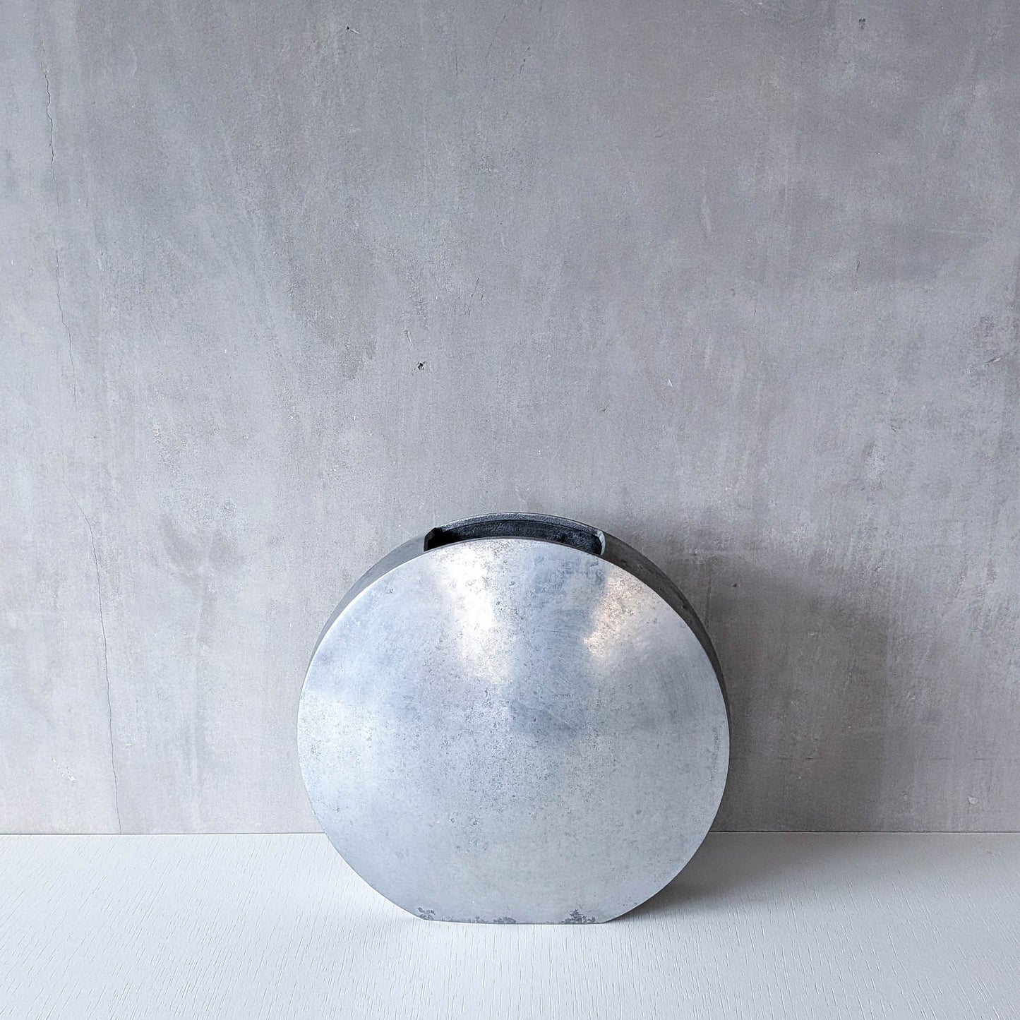 Vintage large sculptural round flat Art Deco style cast aluminium vase