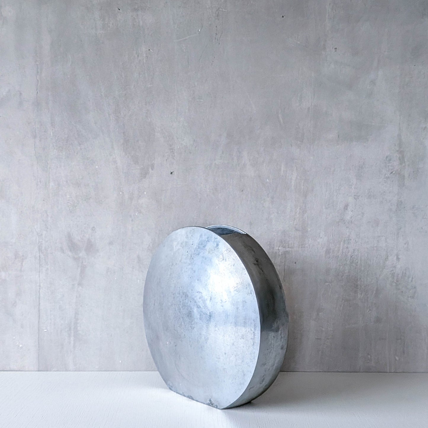 Vintage large sculptural round flat Art Deco style cast aluminium vase