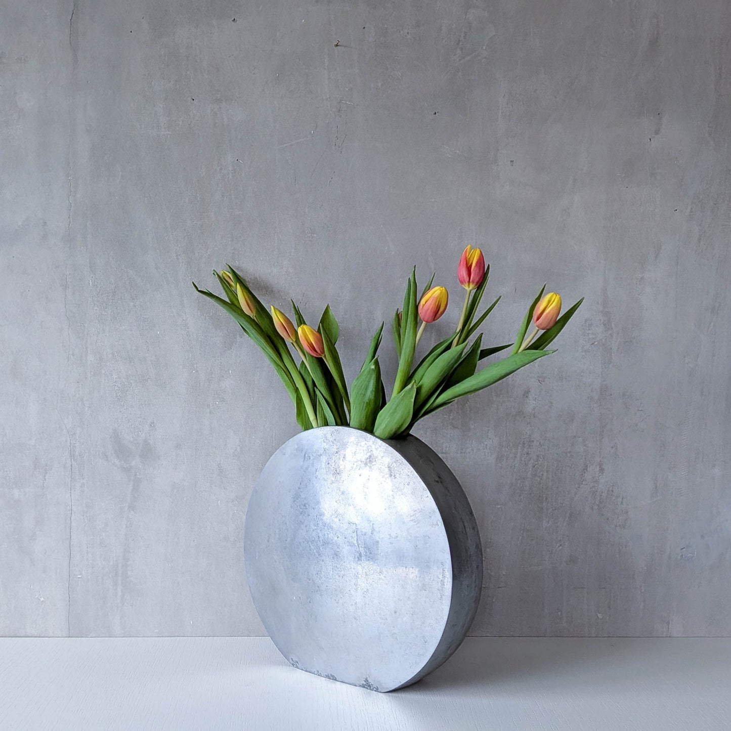 Vintage large sculptural round flat Art Deco style cast aluminium vase