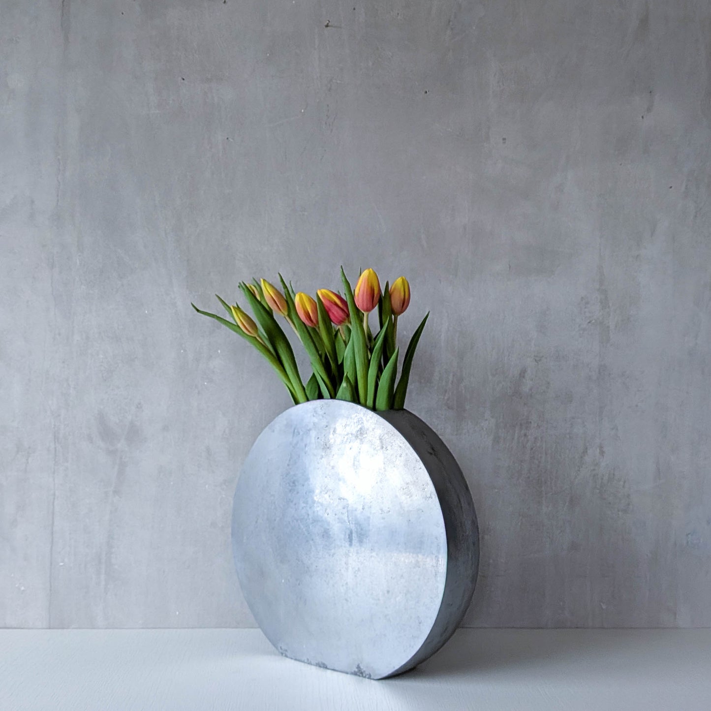 Vintage large sculptural round flat Art Deco style cast aluminium vase