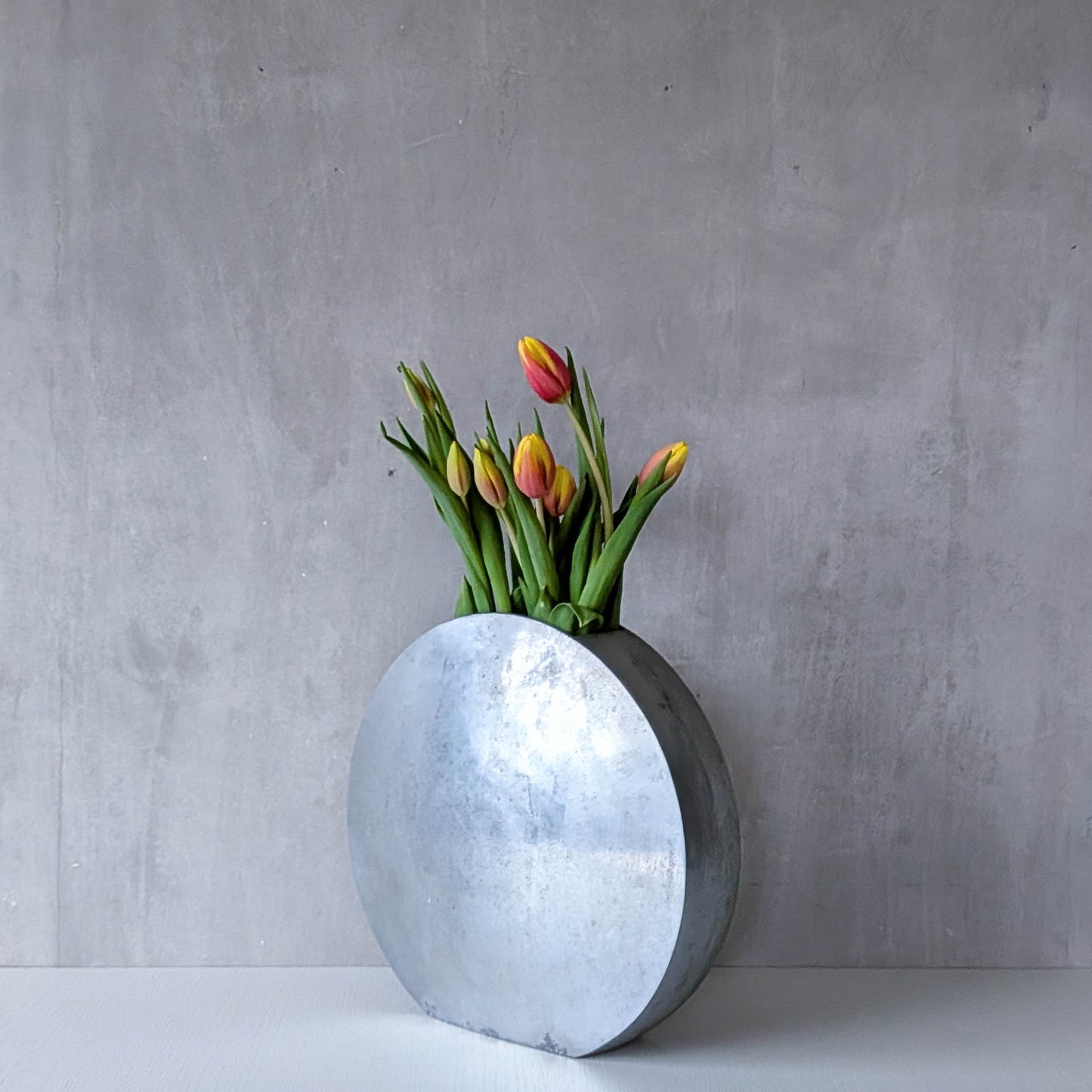 Vintage large sculptural round flat Art Deco style cast aluminium vase