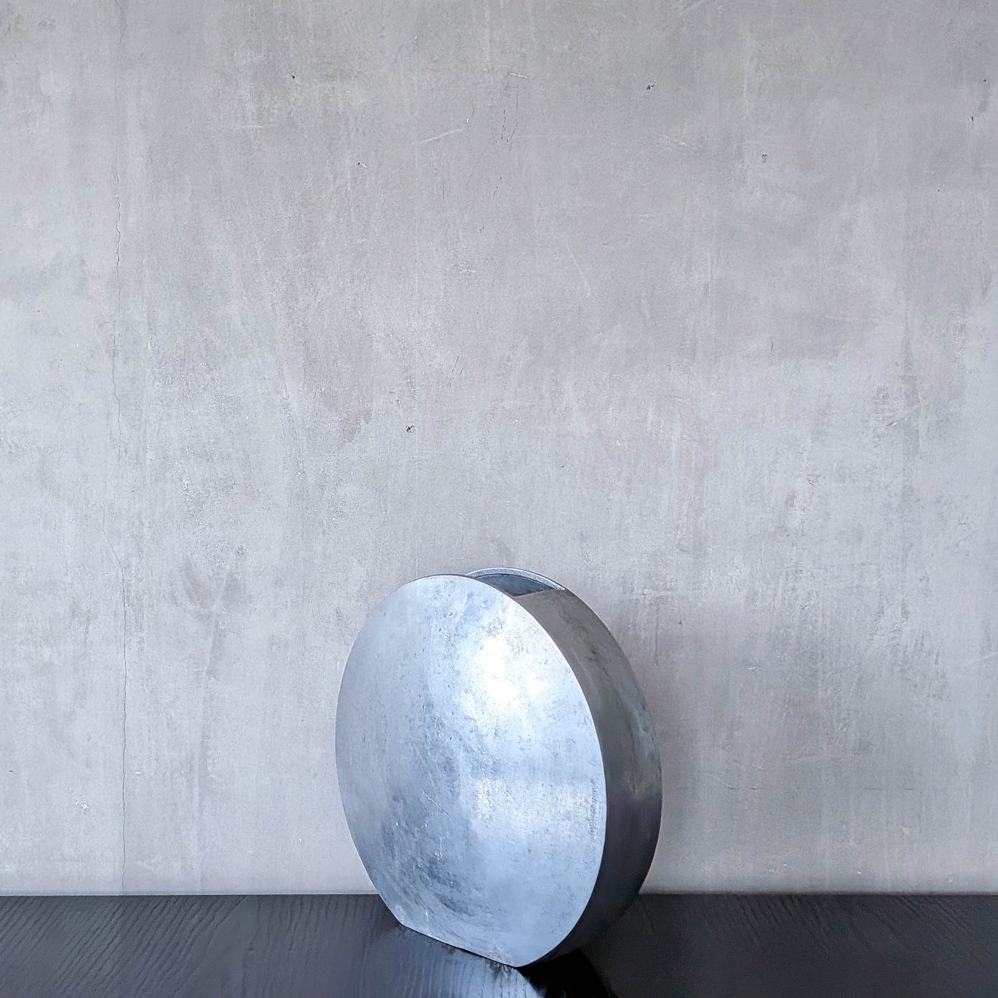 Vintage large sculptural round flat Art Deco style cast aluminium vase