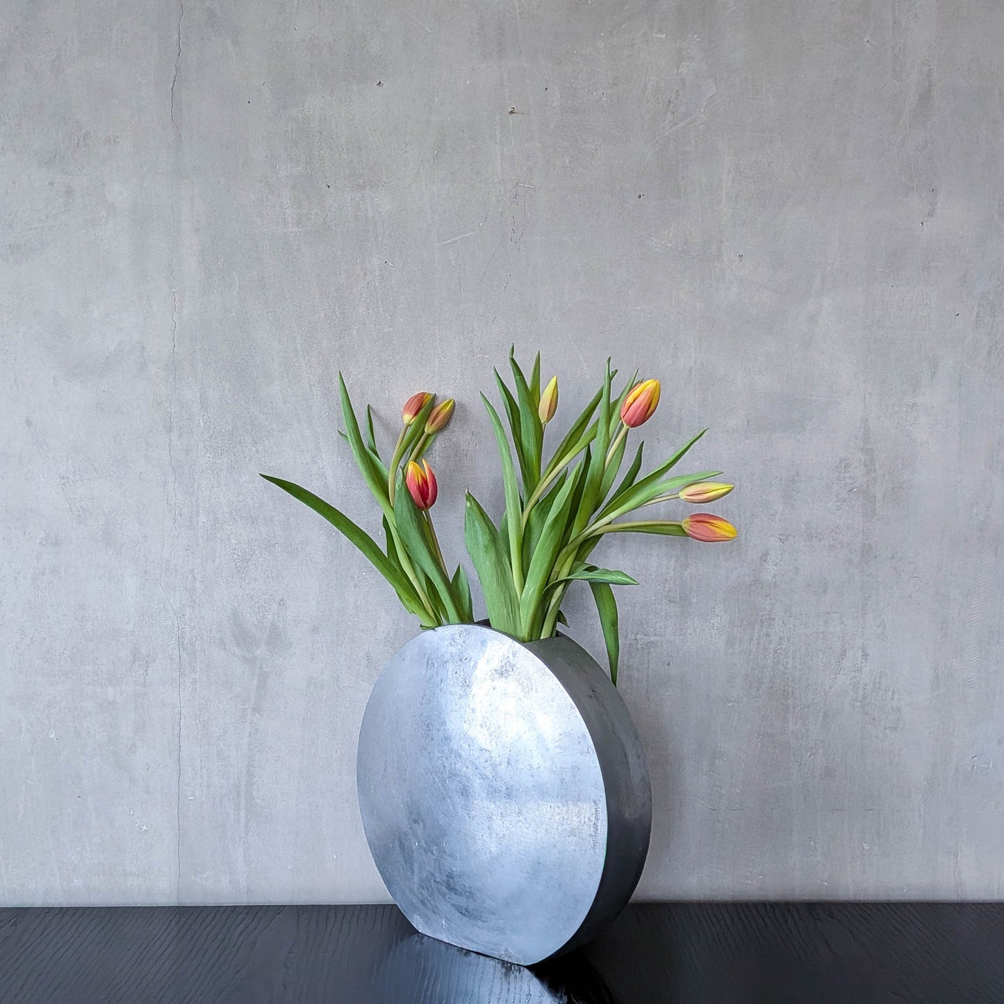 Vintage large sculptural round flat Art Deco style cast aluminium vase
