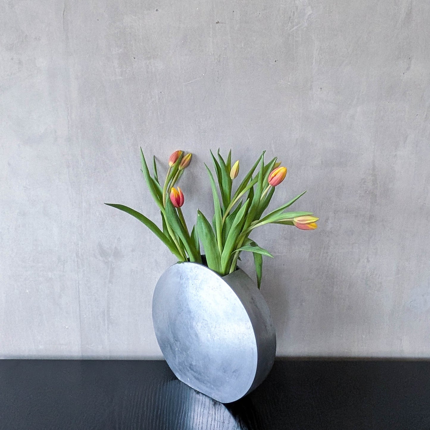 Vintage large sculptural round flat Art Deco style cast aluminium vase