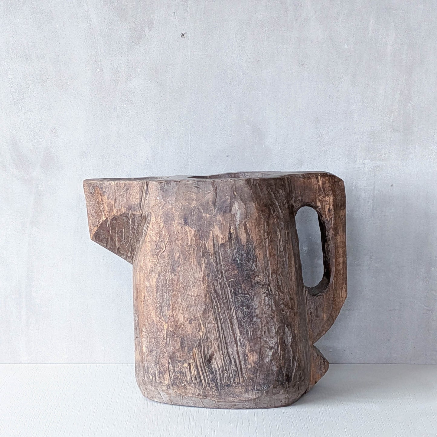 Folk art sculptural heavy hardwood chainsaw cut carved jug 1
