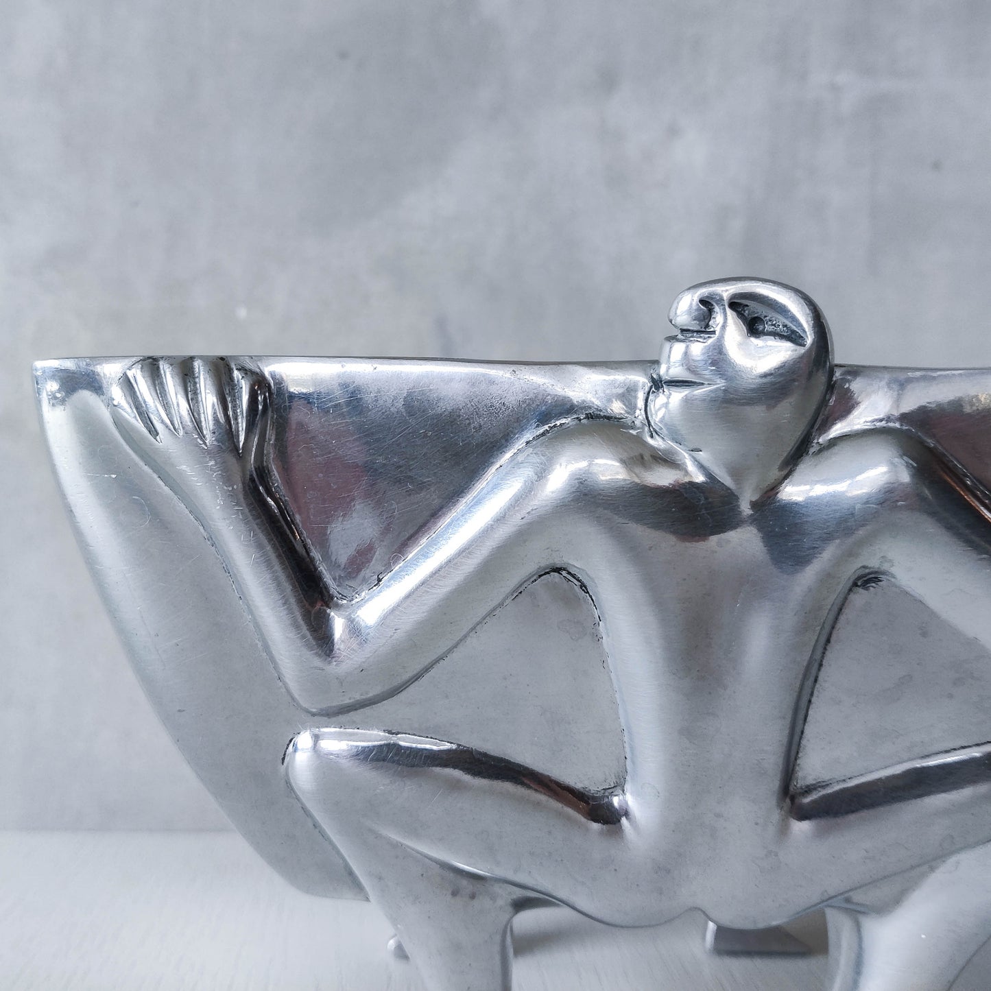 Carrol Boyes 1990s sculptural cast aluminium rectangular fruit bowl with figural feet