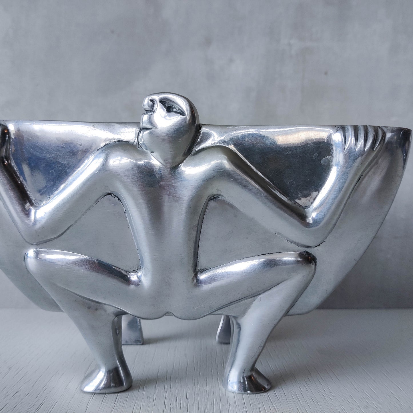 Carrol Boyes 1990s sculptural cast aluminium rectangular fruit bowl with figural feet
