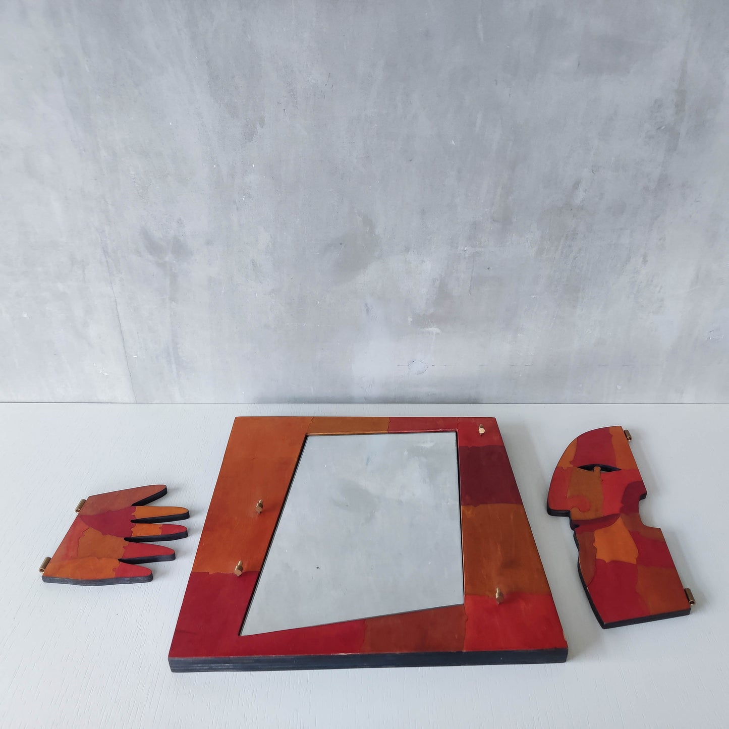 A vintage artist made modernist abstract puzzle mirror with hinged face and hand