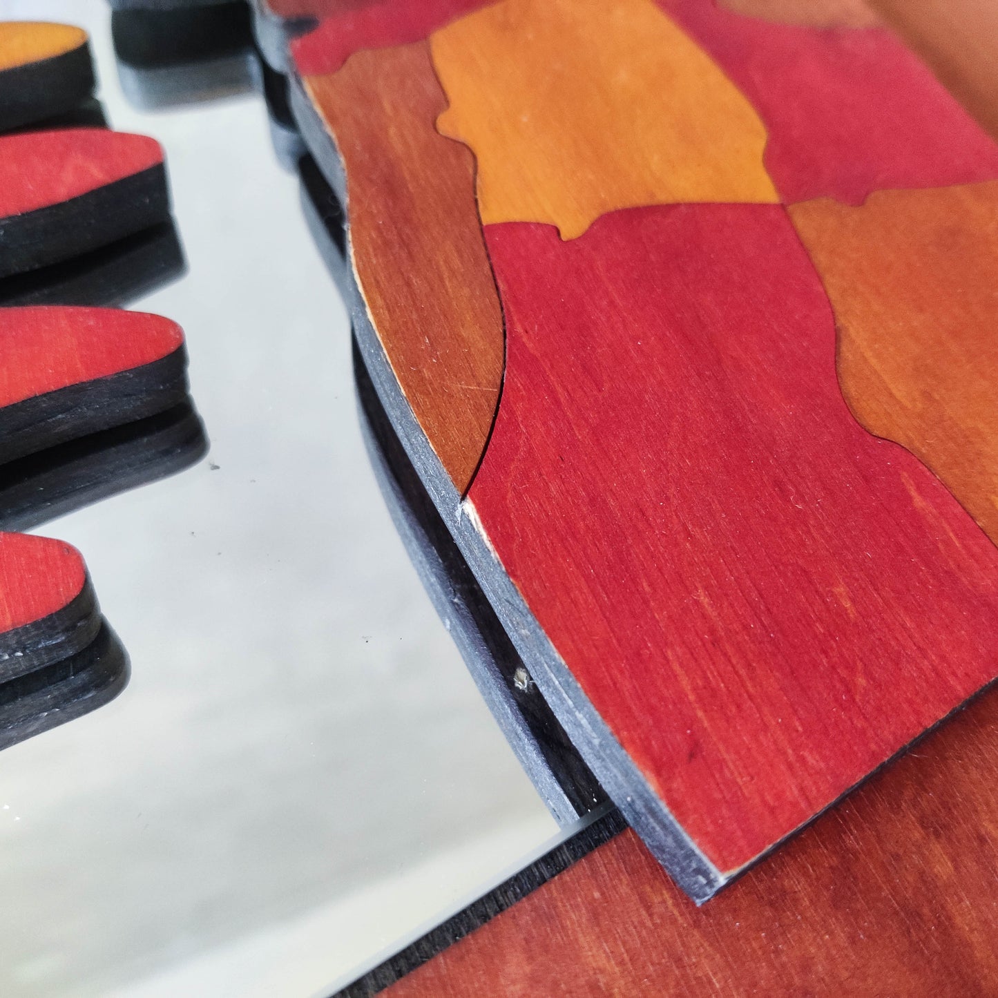 A vintage artist made modernist abstract puzzle mirror with hinged face and hand