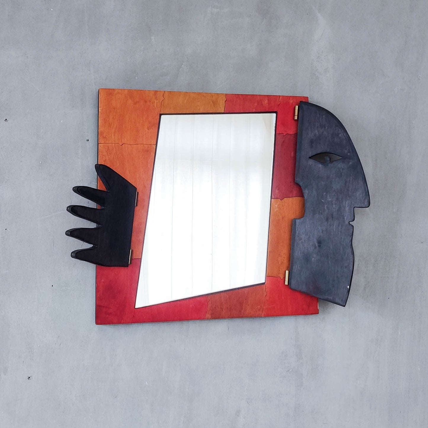 A vintage artist made modernist abstract puzzle mirror with hinged face and hand
