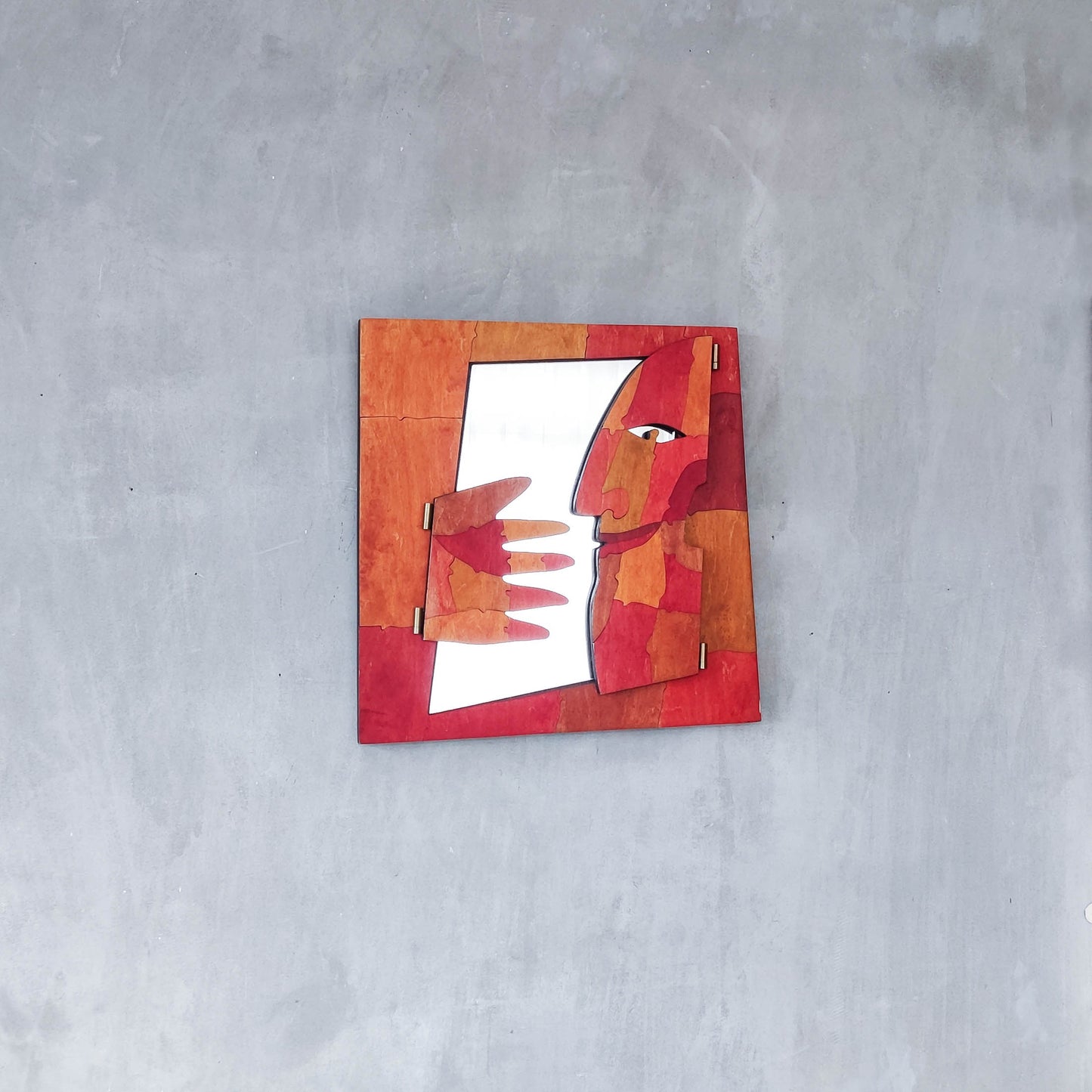 A vintage artist made modernist abstract puzzle mirror with hinged face and hand