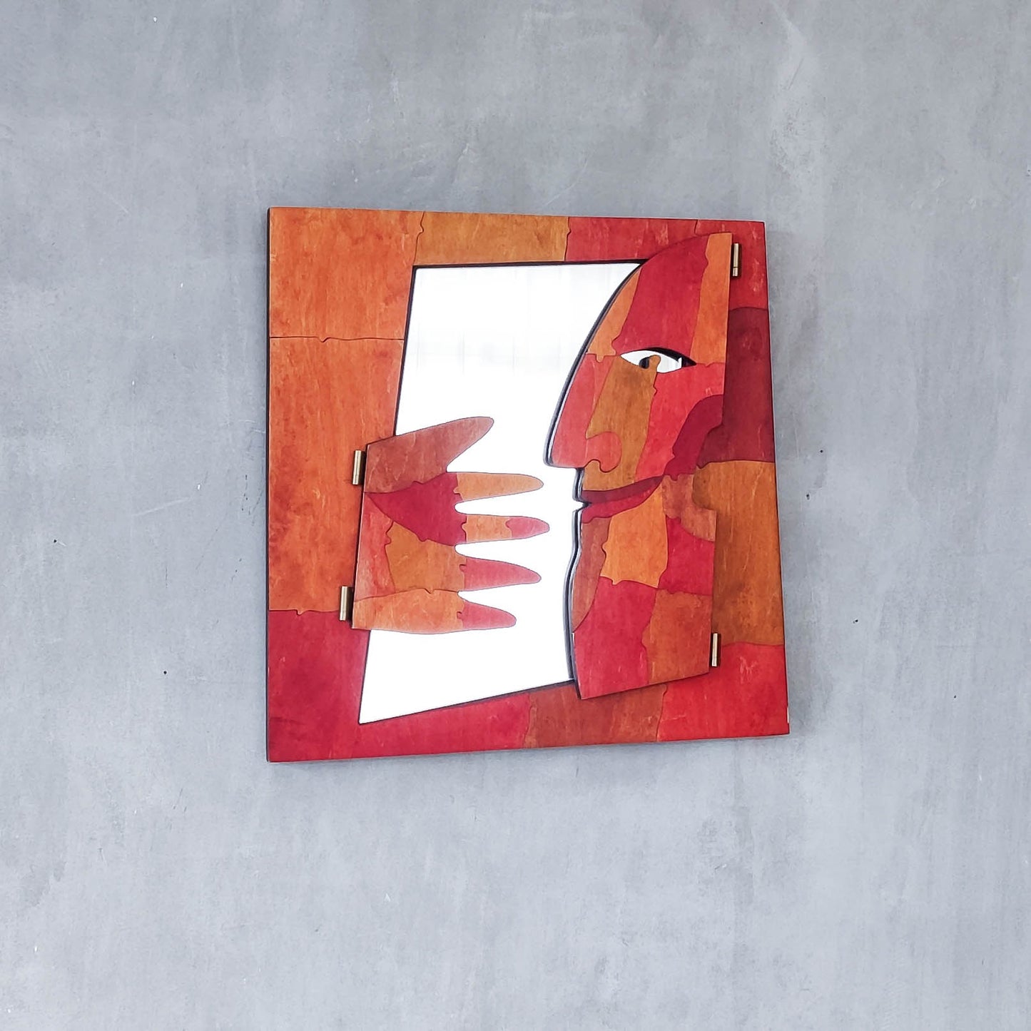 A vintage artist made modernist abstract puzzle mirror with hinged face and hand