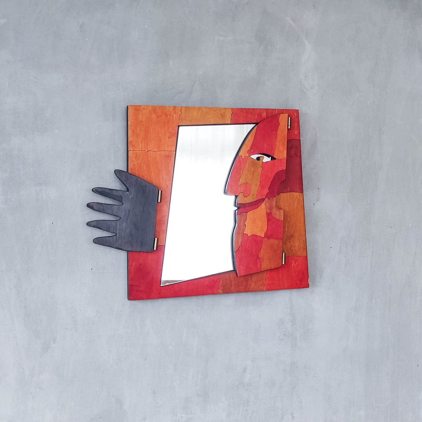 A vintage artist made modernist abstract puzzle mirror with hinged face and hand