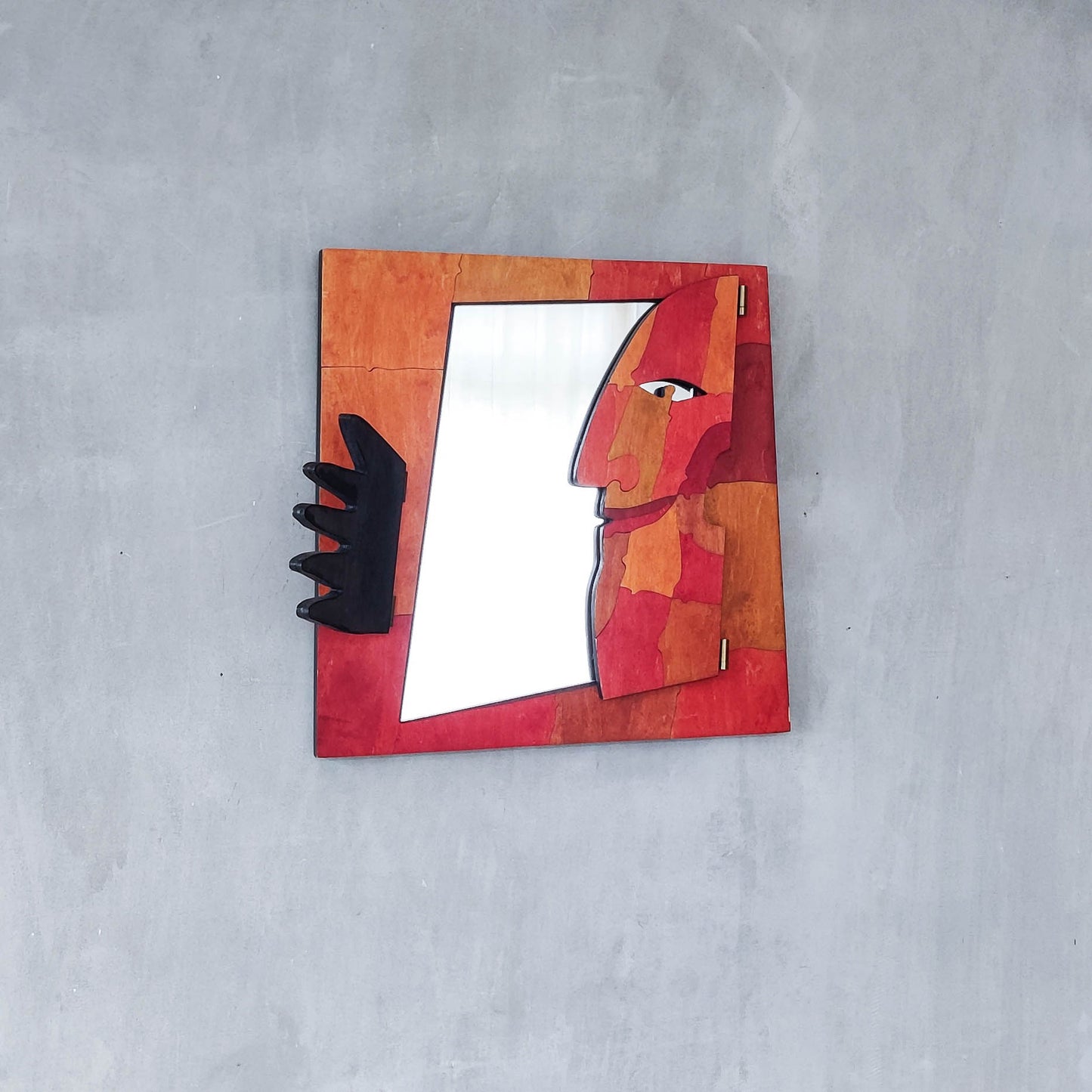 A vintage artist made modernist abstract puzzle mirror with hinged face and hand